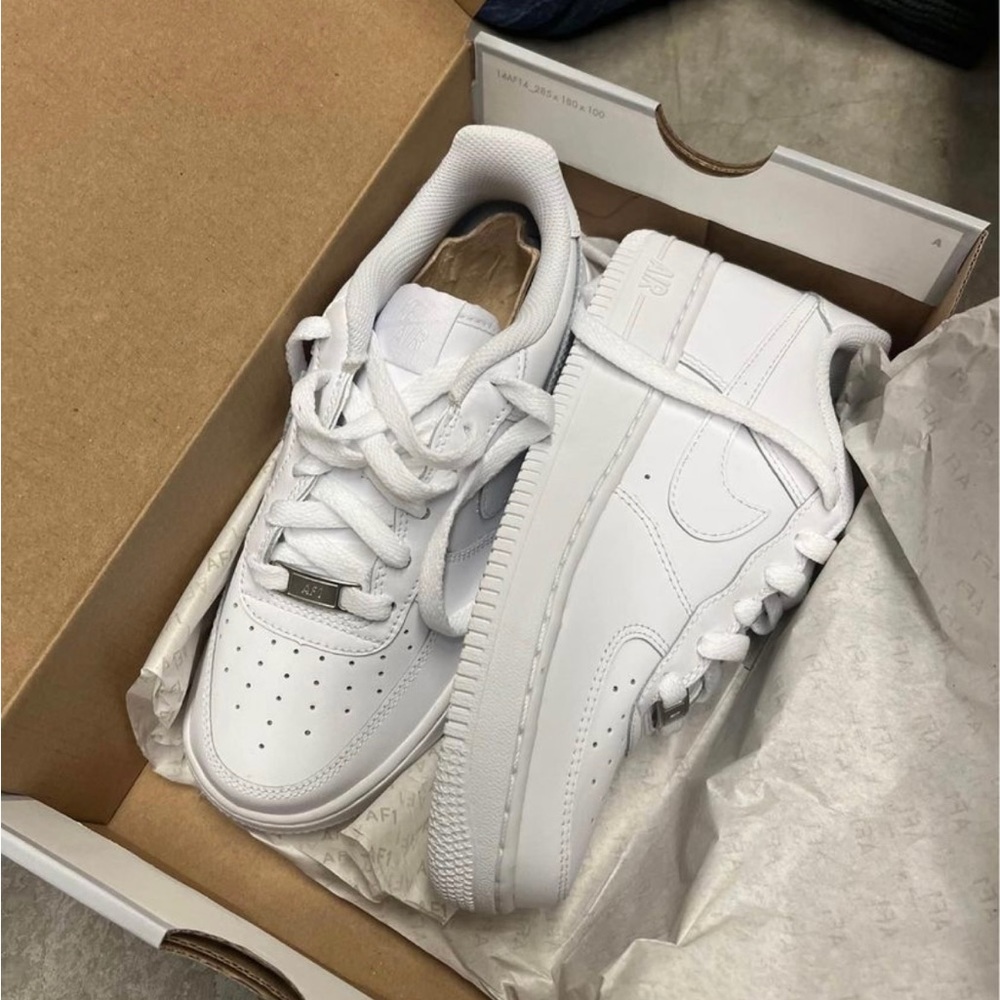 Size 4 Youth Nike Air Force 1, never been worn.